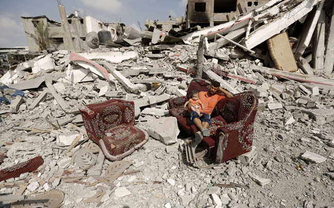 145636 695 بازگشت مردم غزه به خانه های خراب شده (تصاویر)