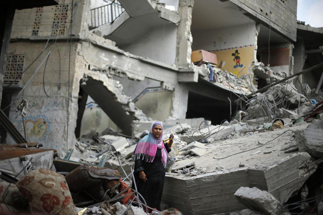 145658 723 بازگشت مردم غزه به خانه های خراب شده (تصاویر)