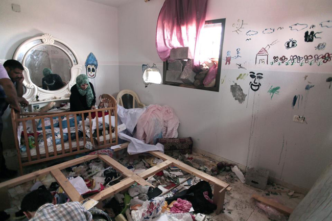 145662 713 بازگشت مردم غزه به خانه های خراب شده (تصاویر)