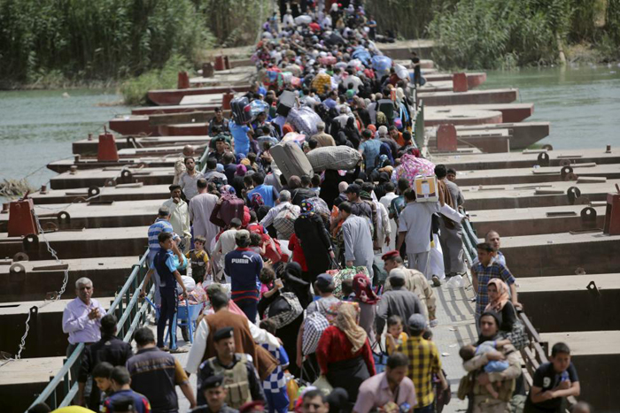 (تصاویر) فرار مردم «الرمادی» از دست داعش