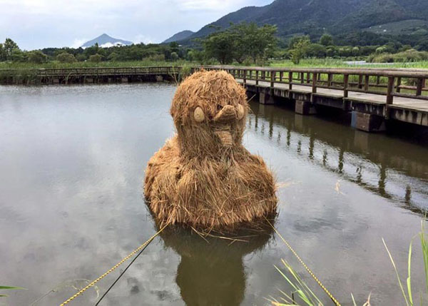 (تصاویر)جشن برداشت برنج در ژاپن با جانوران غول پیکر!‌