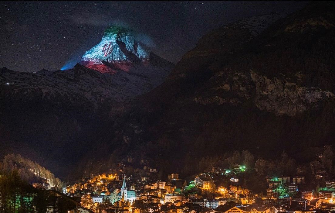 (عکس) تصویر پرچم ایران روی کوهی در سوئیس