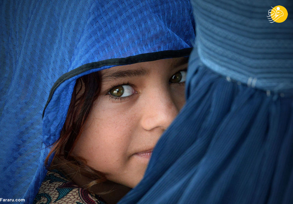 دختر افغان در مرکز بازگشت به کشور در ناوشراش، پاکستان